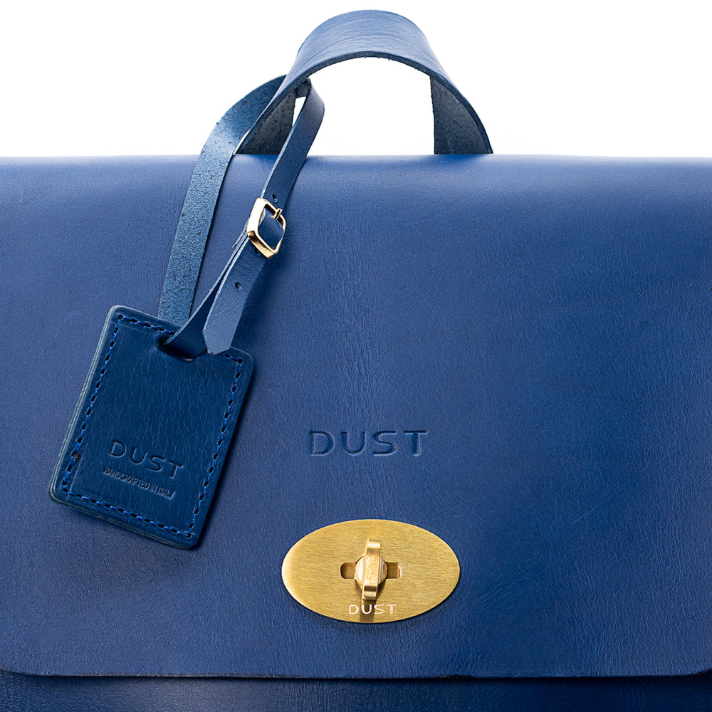 
                      
                        Leather Backpack in Cuoio Blue Artist Collection
                      
                    