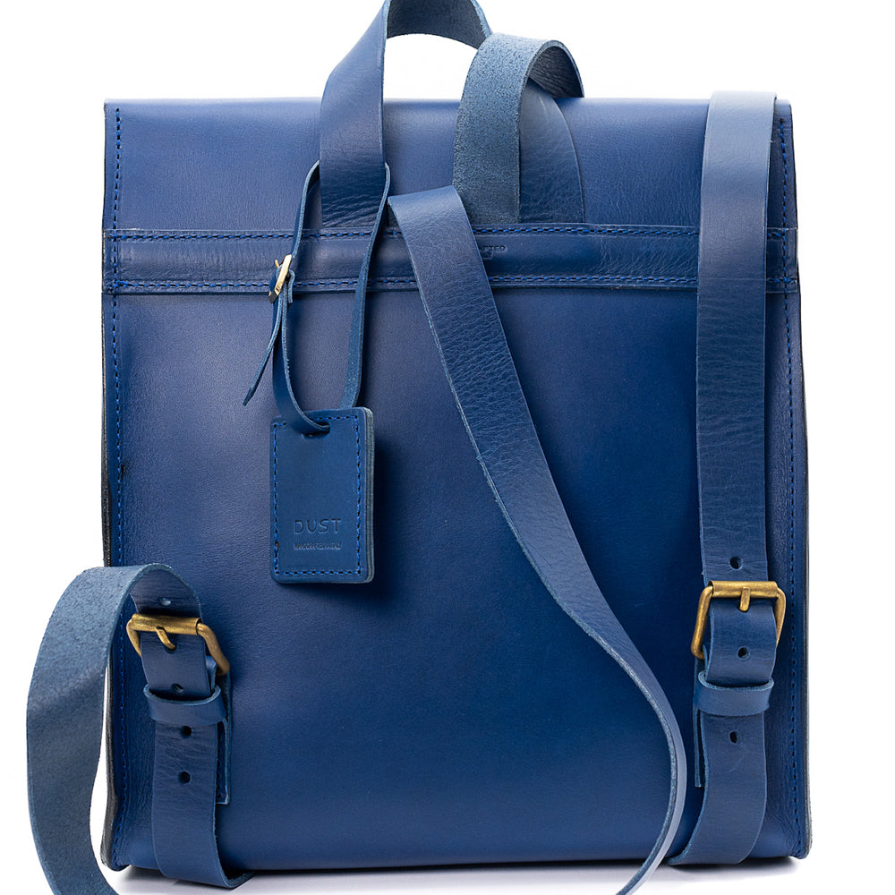 
                      
                        Leather Backpack in Cuoio Blue Artist Collection
                      
                    