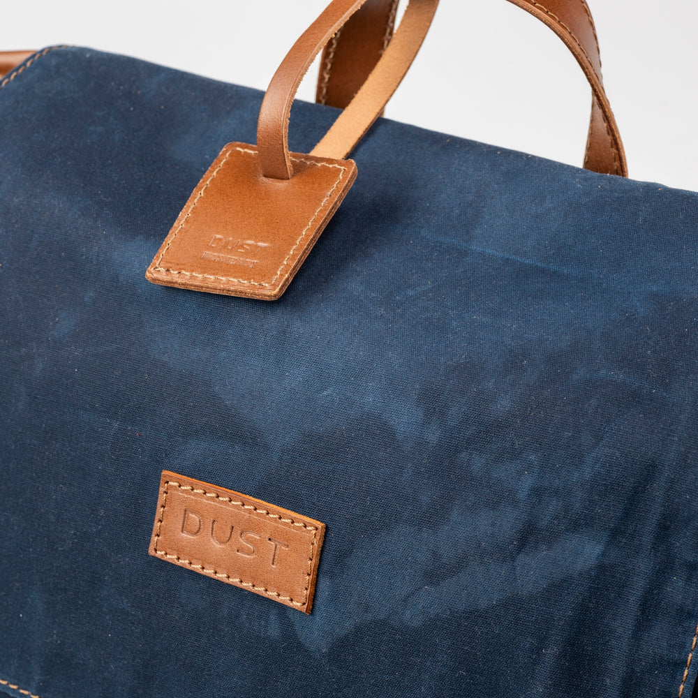 
                      
                        Leather Backpack In Waxed Cotton Made in USA Blue
                      
                    