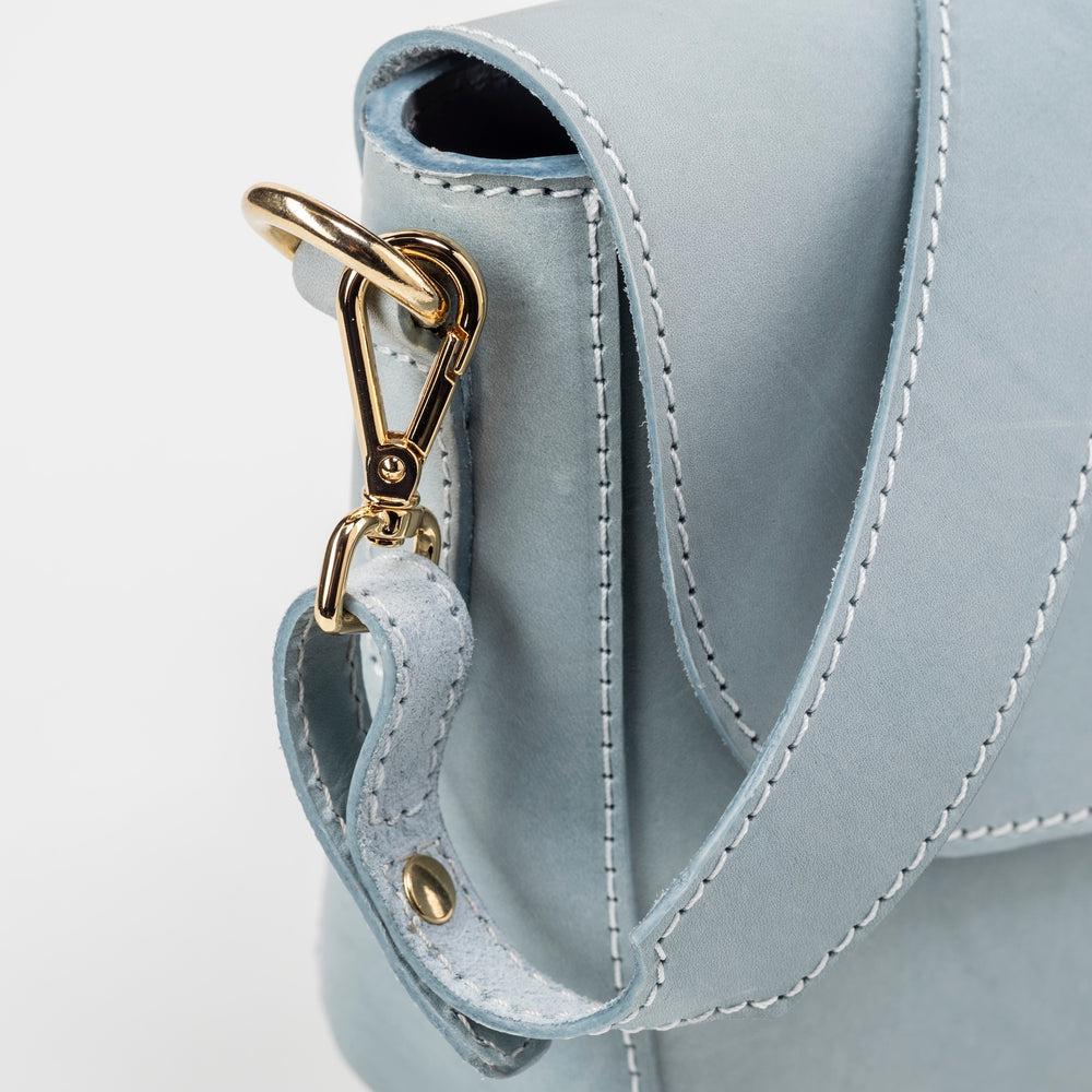 
                      
                        Leather Crossbody Light Blue Broadway Collection
                      
                    