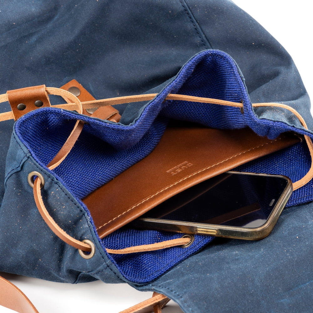 
                      
                        Leather Backpack With Waxed Cotton Made in USA Blue
                      
                    