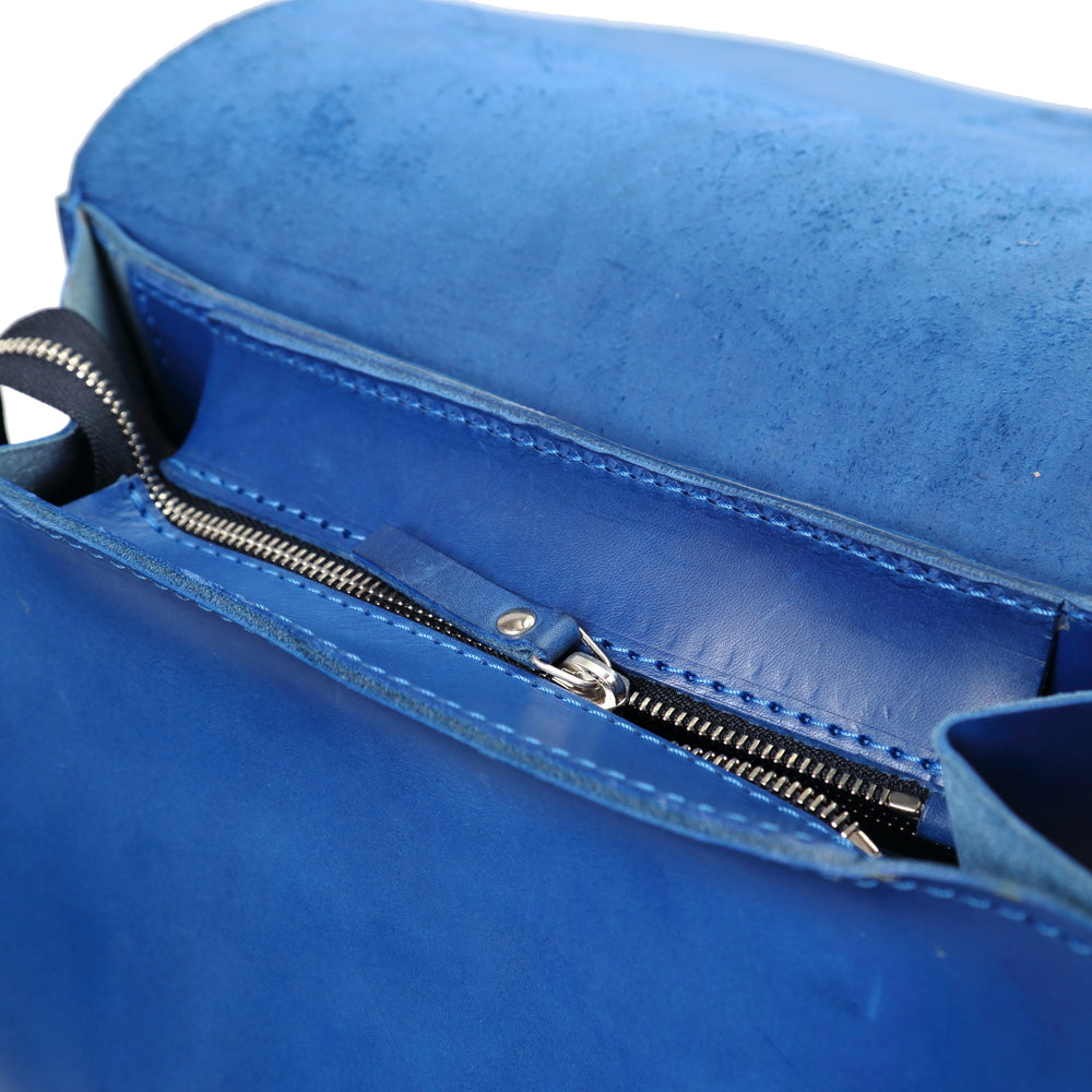 
                      
                        Leather Backpack in Cuoio Blue Mod 120
                      
                    