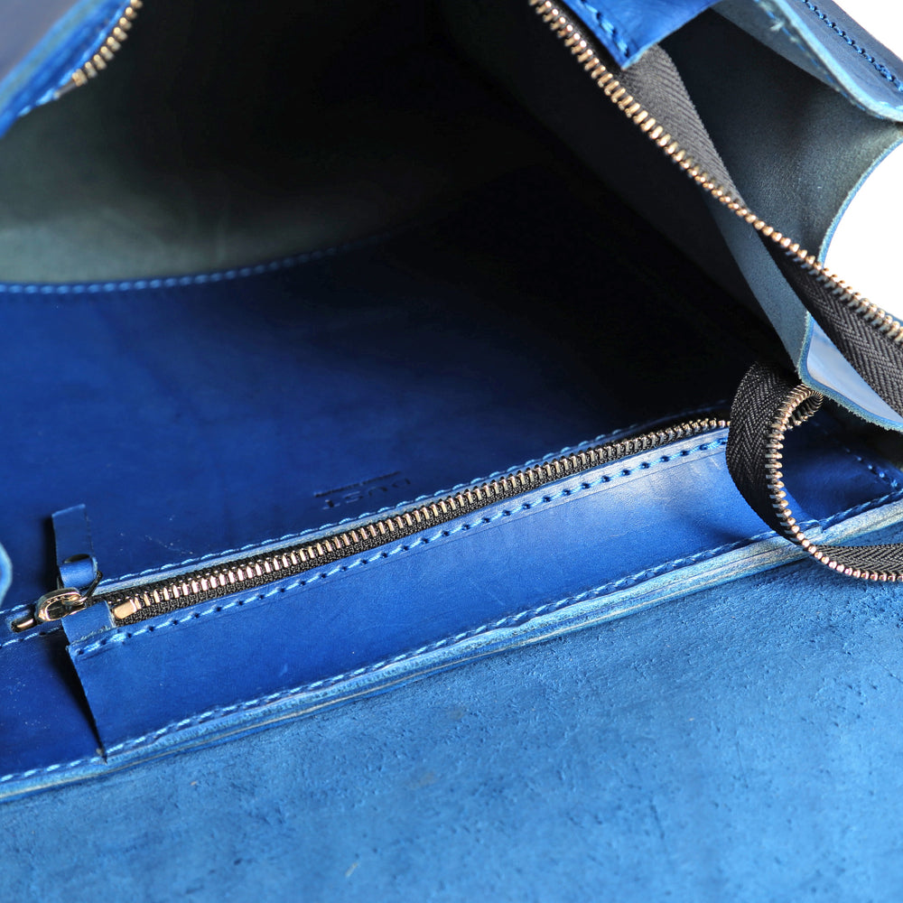 
                      
                        Leather Backpack in Cuoio Blue Mod 120
                      
                    