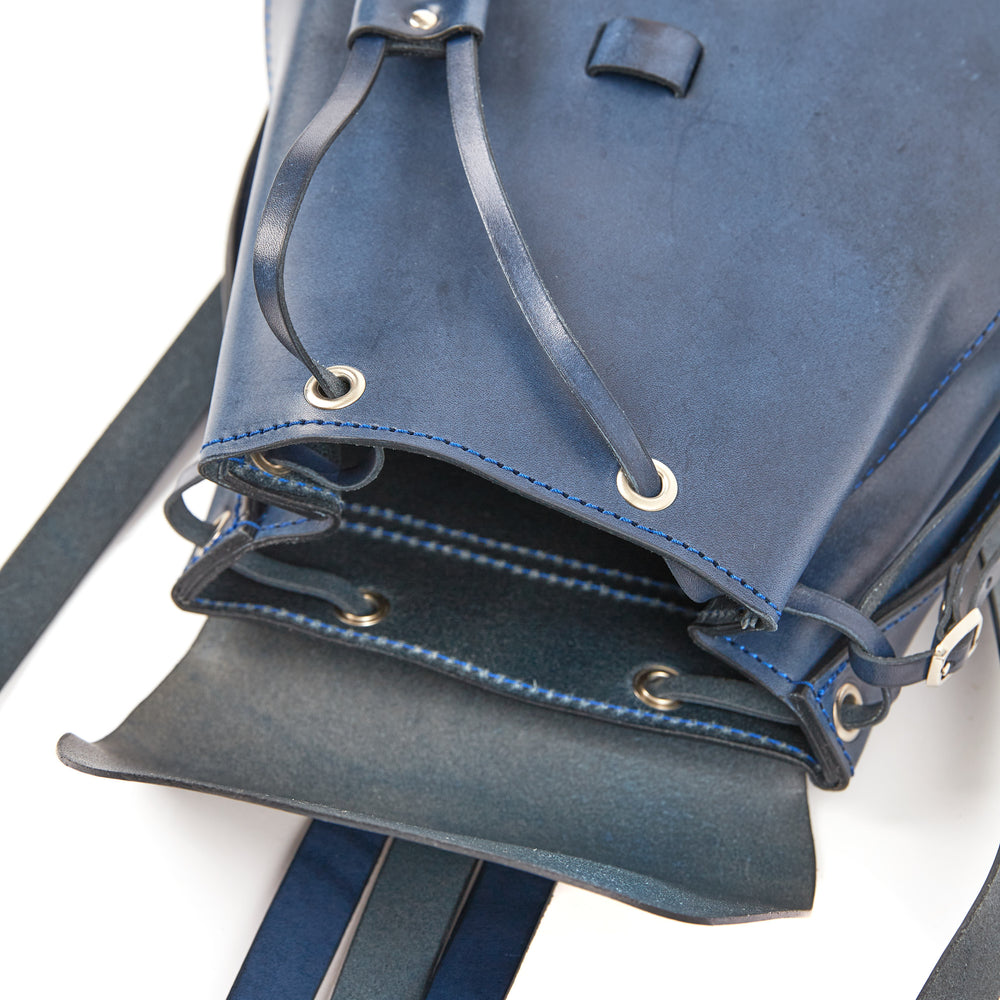 
                      
                        Leather Backpack in Cuoio Blue Mod 130
                      
                    