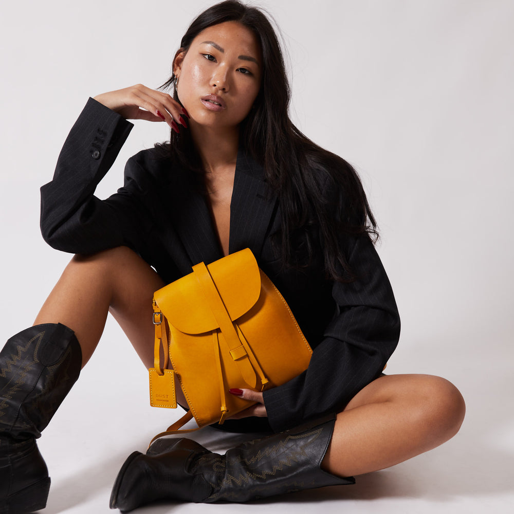 
                      
                        Leather Backpack in Cuoio Yellow Mod 130
                      
                    