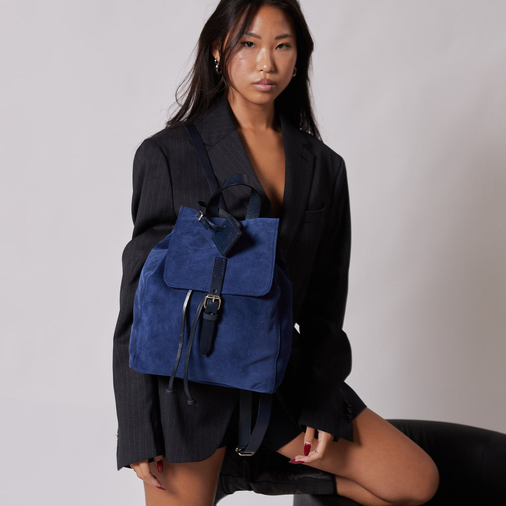 
                      
                        Leather Backpack in Suede Blue Venice Collection
                      
                    