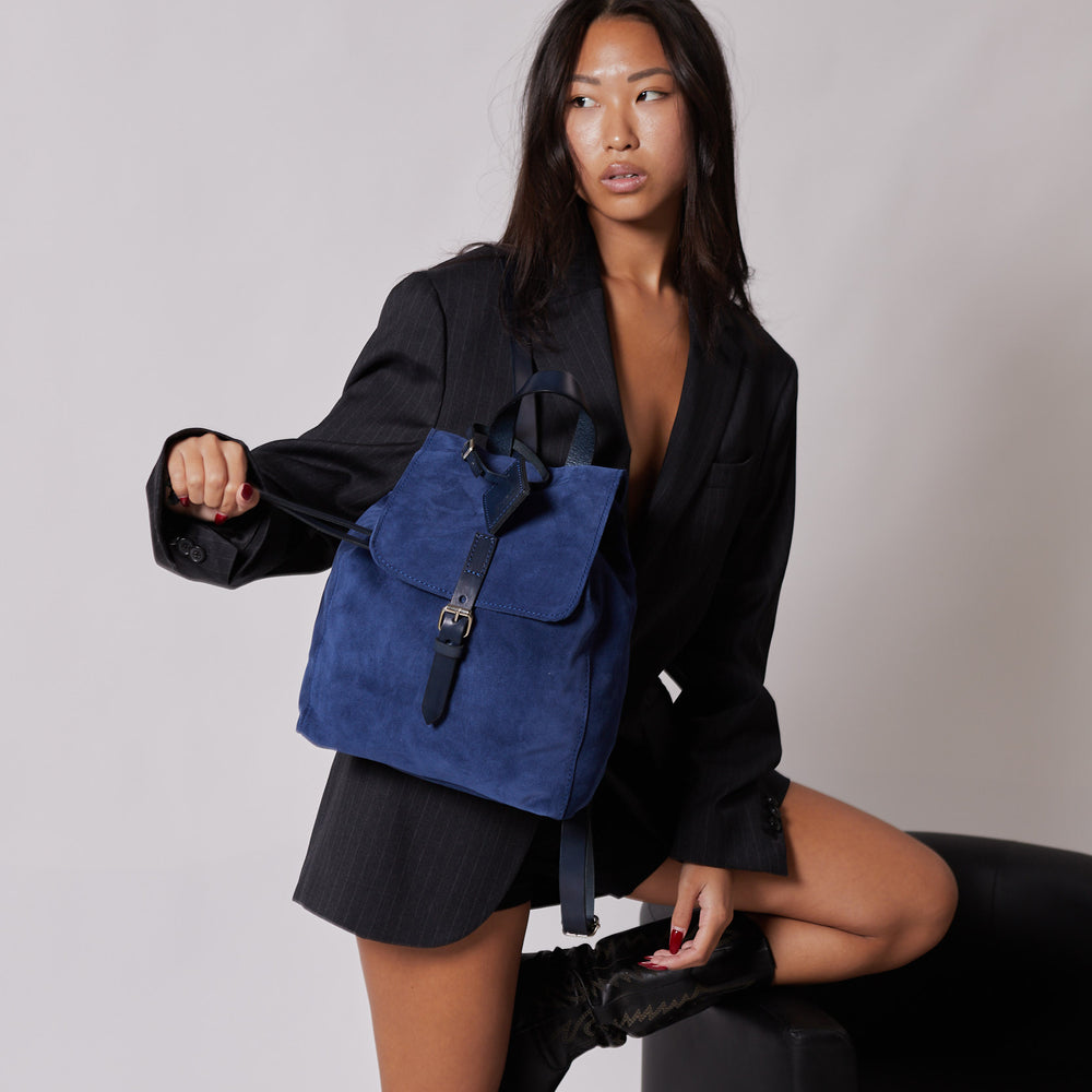 
                      
                        Leather Backpack in Suede Blue Venice Collection
                      
                    