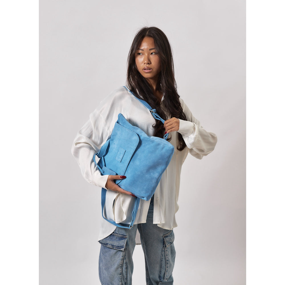 
                      
                        Leather Backpack Light Blue  Upper West Side Collection
                      
                    